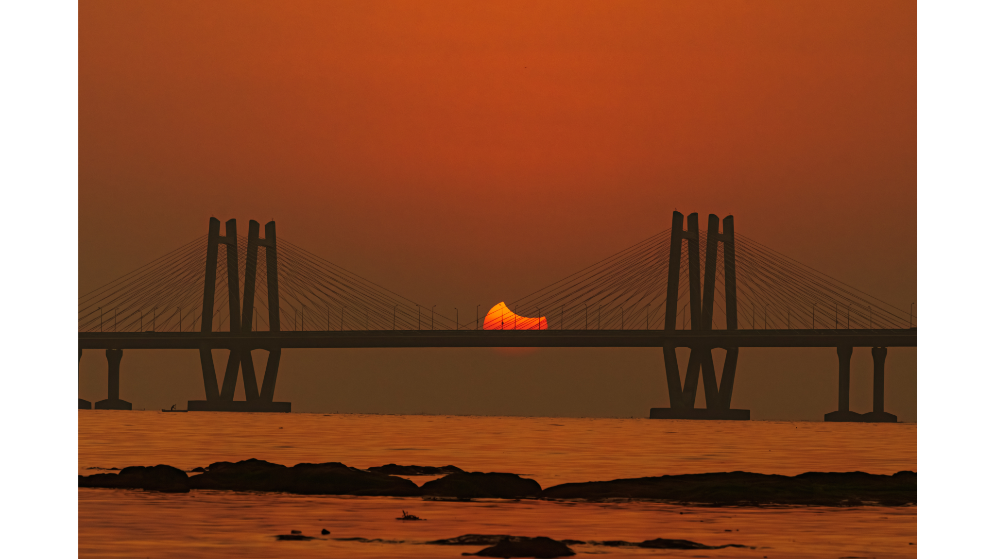 Ankur Tambde Solar Eclipse behind the Giant Sea Link Mumbai Maharashtra India