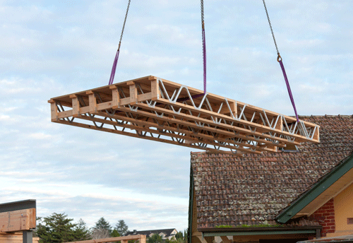 The cassettes are prefabricated offsite and then craned into position.