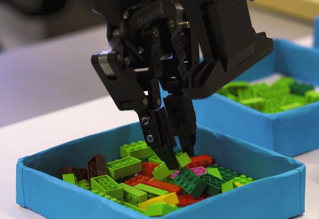 BrickBot plays with Lego to learn construction skills