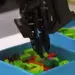 BrickBot plays with Lego to learn construction skills