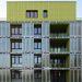 Hamburg's Bio Intelligent Quotient building uses panels filled with algae and water to generate solar thermal energy.