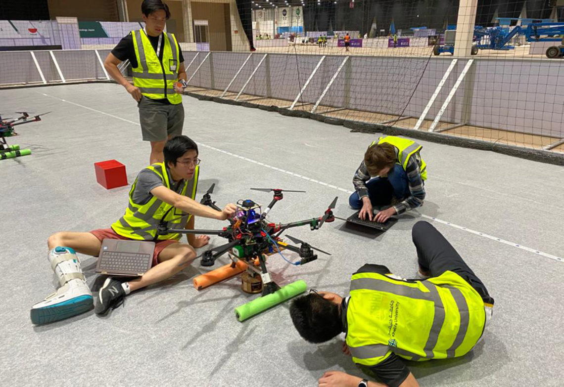 UNSW undergrad team flies the Australian flag at the International Robotics Competition