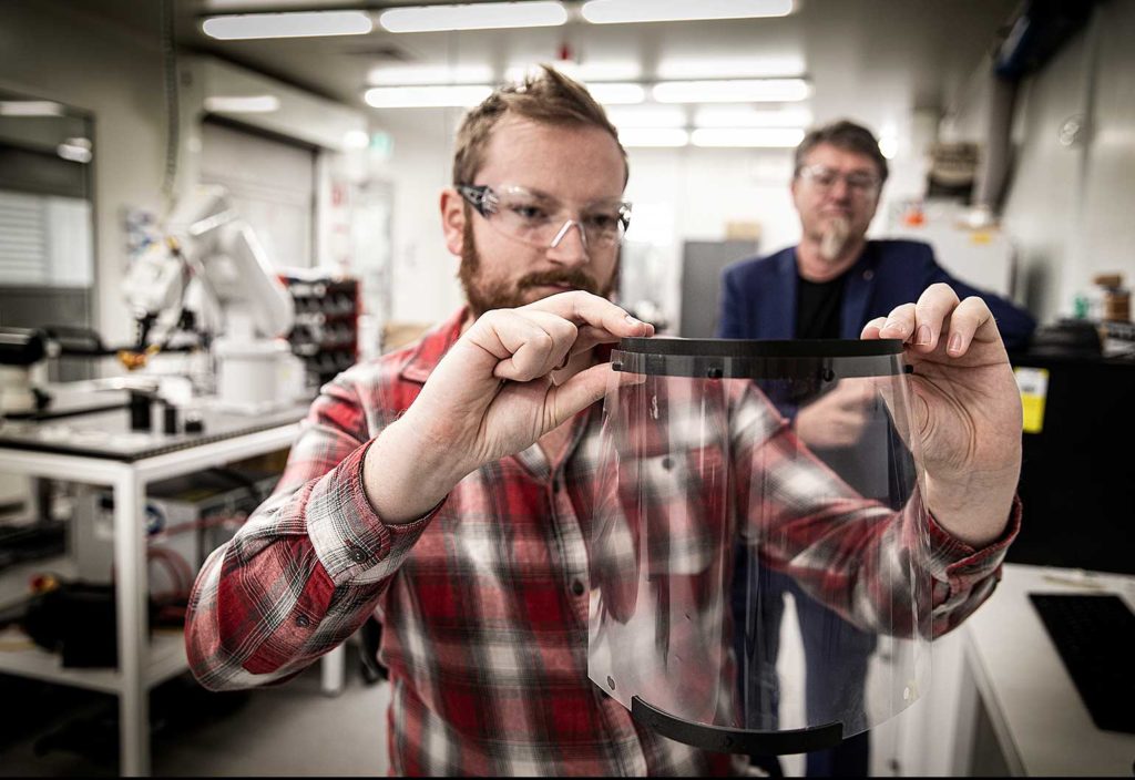 Professor Gordon Wallace (right) and additive fabrication technician Cameron Angus at the University of Wollongong’s TRICEP facility.