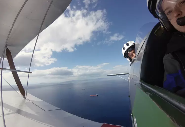 Sarah Meehan (right, in front cockpit) flew a Tiger Moth biplane from Greece to southern Africa.