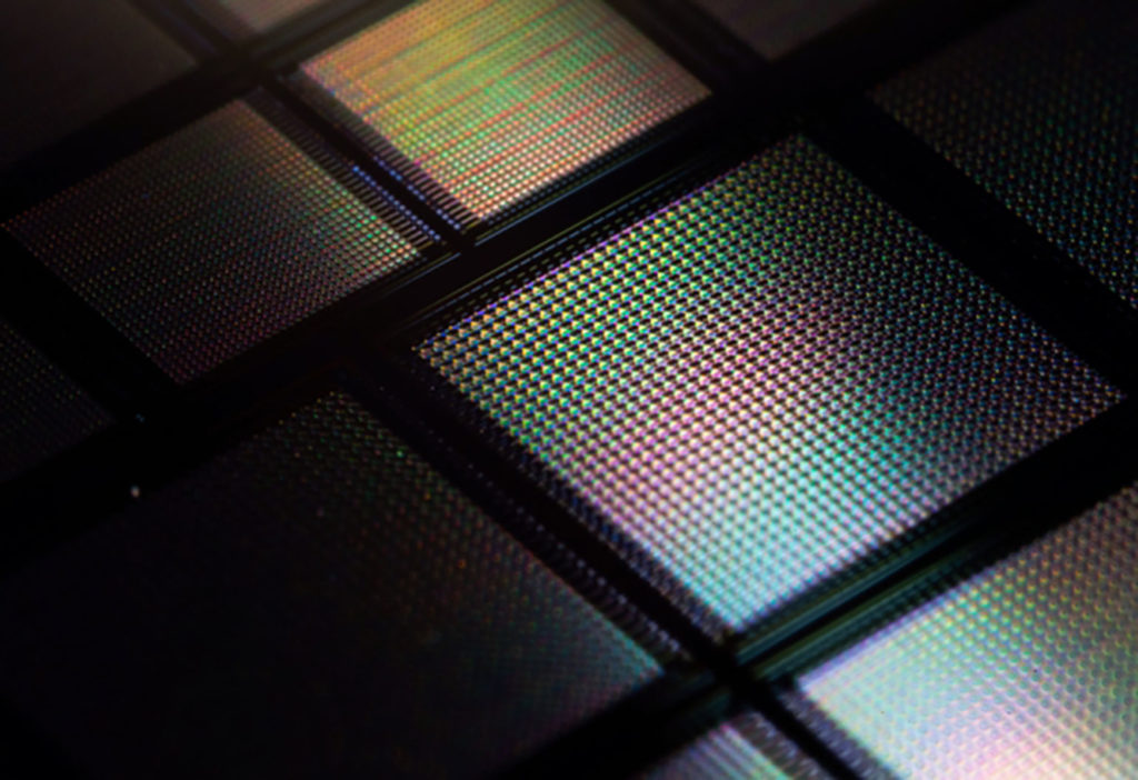 A close-up view of a new neuromorphic 'brain-on-a-chip' that includes tens of thousands of memristors, or memory transistors. (Image: Peng Lin)
