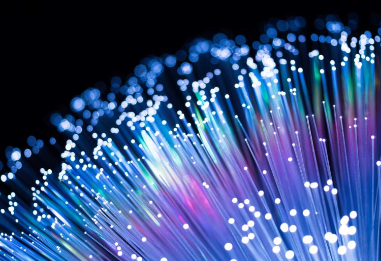 Researchers developed an optical micro-comb, which creates a rainbow of infrared light allowing data to be transmitted on many frequencies at the same time, vastly increasing bandwidth.