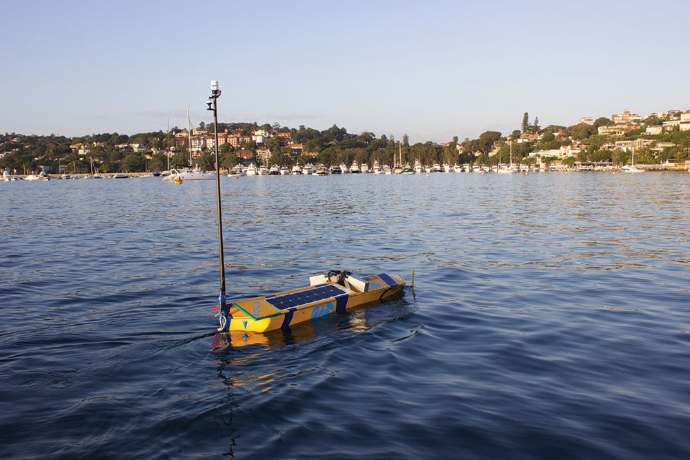 Nemo with the sail folded down on Sydney Harbour.