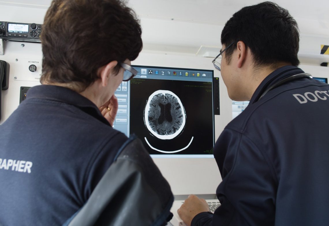 A doctor and radiographer inside Melbourne's stroke ambulance