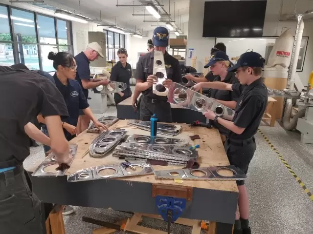 Students with their aircraft parts