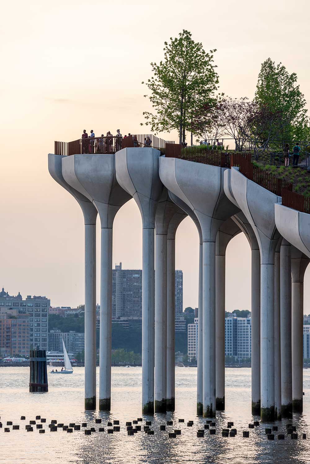 Little Island's original design concept pictured a park ‘floating’ above the Hudson River, propped up by a complex array of piles of differing heights. (Image: Timothy Schenck)