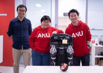 Robotics researcher Hanna Kurniawati (centre) at ANU.