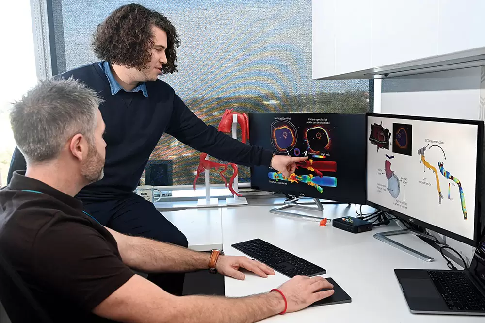 Associate Professor Barry Doyle (seated) and Dr Lachlan Kelsey