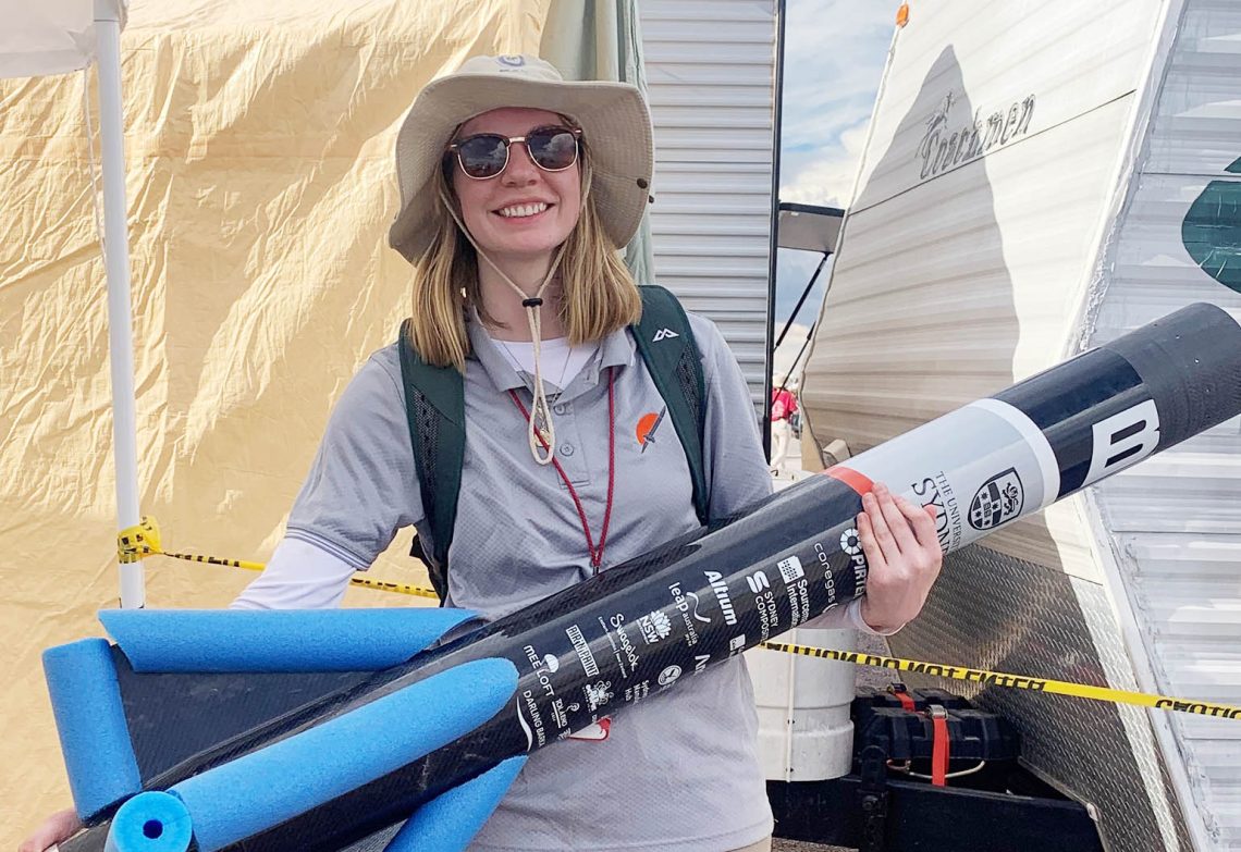 Alison Lockley holding a rocket