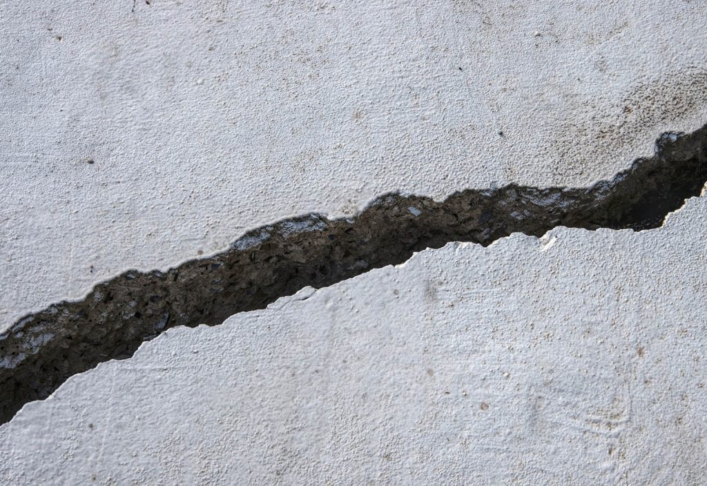 A large crack in concrete - the kind that could be detected using AI