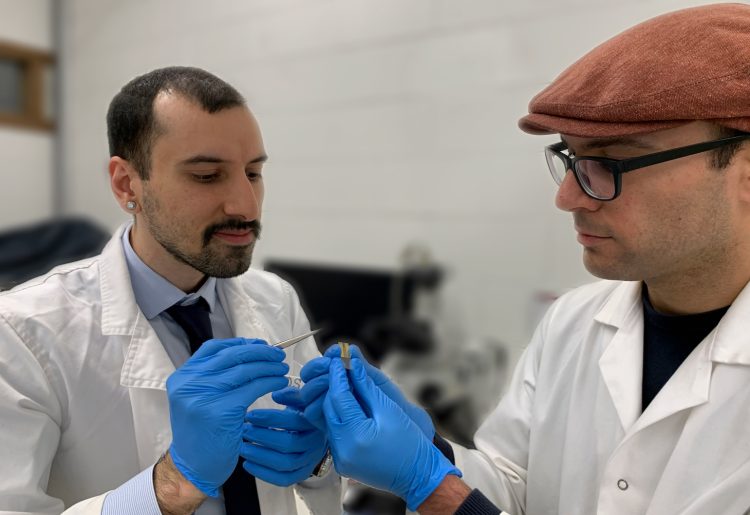 Mr Hossein Alijani and Dr Amgad Rezk with the new rust-busting device. Credit: RMIT University