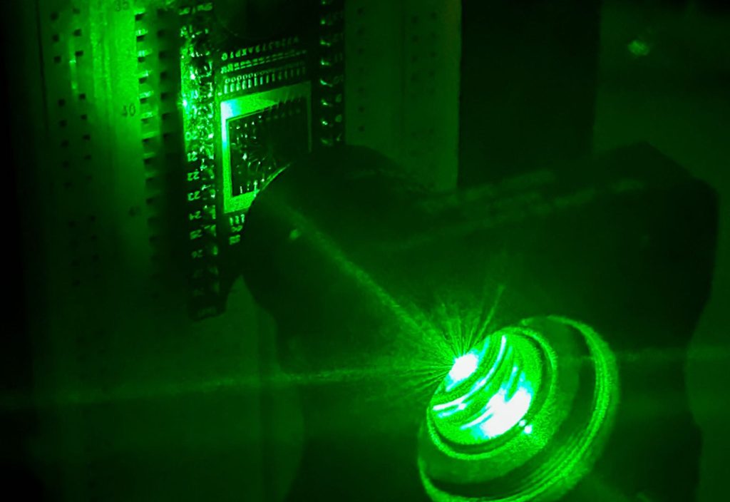 A visible light experiment is used to demonstrate the chip’s capabilities. Image: RMIT University