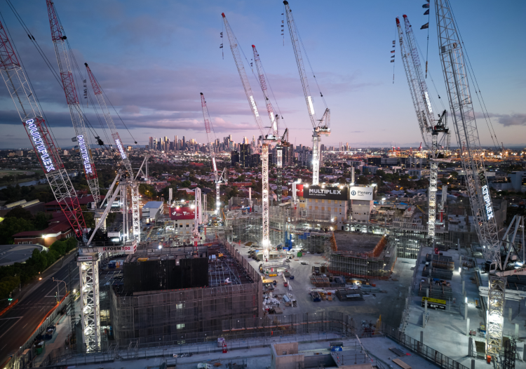 The Footscray Hospital under construction in the early afternoon, featuring almost 10 cranes pointing up to the sky.