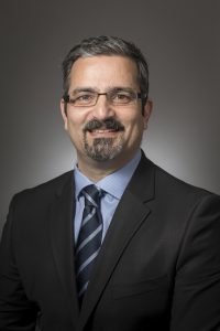 A headshot of Hamed Sharafizad.
